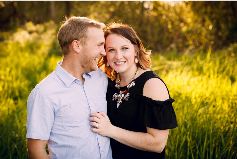 sunset in woods laughing couple hovander engagement session 