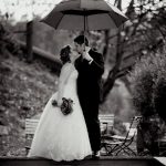 roche harbor winter wedding in rain with umbrella