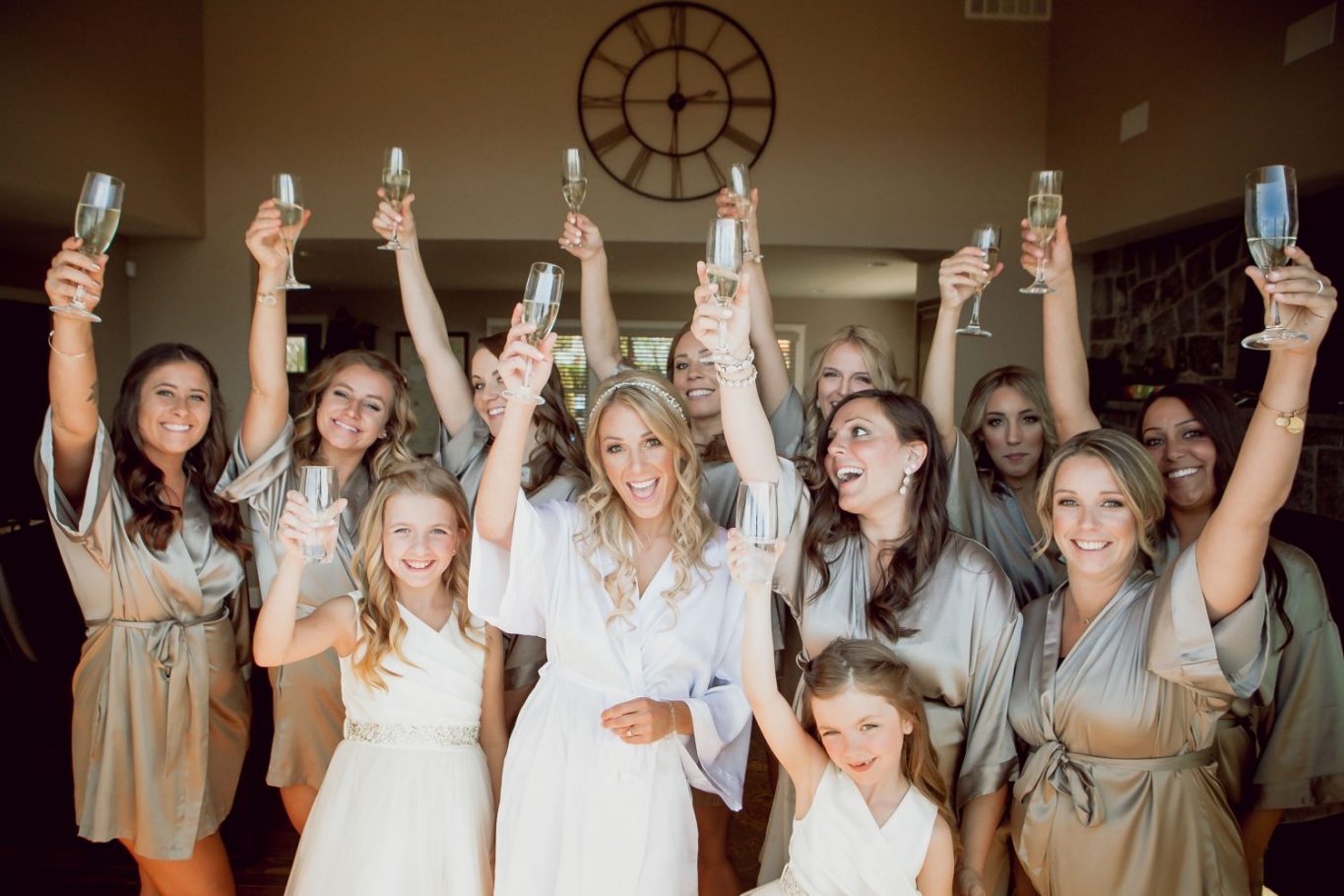 bridesmaids-getting-ready-with champagne-silver-gold